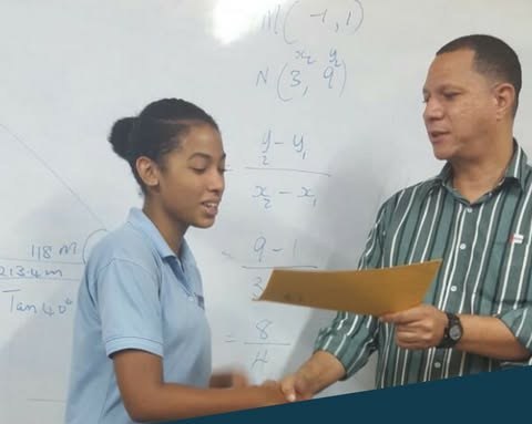 Mr. Paul Oliver Downer with a student