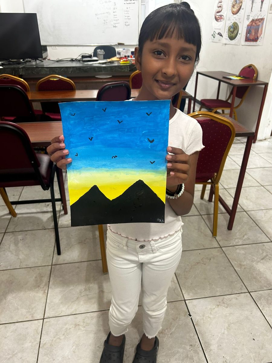 Young student with her painting